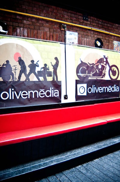 Olive Media signs lined the walls on the outdoor patio.