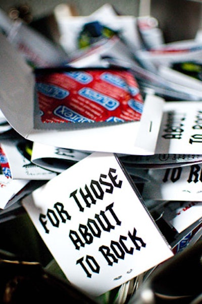 Bowls full of condoms, wrapped in the company's Twisted Olive logo, topped tables throughout the venue.