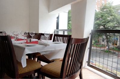 The second-floor veranda seats up to 20 guests.