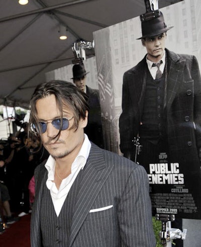 Johnny Depp signed autographs and posed for photos on the red carpet.