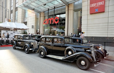 Universal Studios provided 1930s vehicles, which appear in the film, to decorate the entrance to the AMC theater.