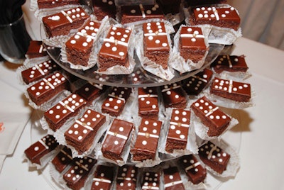 Cake Designs by Edda served petit fours decorated like dominoes.
