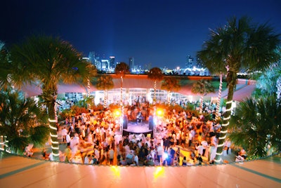 The party continued in the courtyard after the ballroom on the third floor opened for domino games.