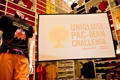 Throughout the competition, Uniqlo projected game play from the miniature arcade above the event.