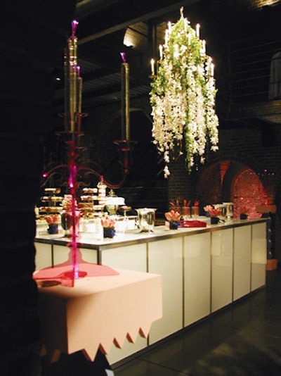 The Kiss on the Lips Dance during the first season had a Marie Antoinette theme, and Weeks used pink and blue touches, including acrylic candelabra, to decorate the Foundry. Floral designer Sung Jung of Doro's Annex filled one of the venue's alcoves with strung crystals and orchids lit by LEDs.
