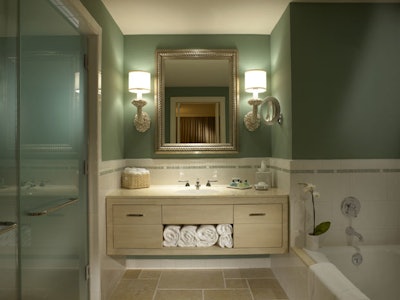 Mossy green paint dresses up a guest room bathroom.