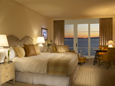 A guest room has a palette of earth tones.