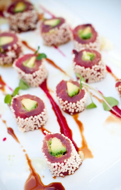 Servers passed tuna sashimi rolls with wasabi mousse and sesame crackers.