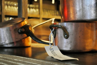 DBGB is decorated with cookware and other references to the culinary arts, including a collection of copper pots and pans donated by chefs such as Emeril Legasse and Ferran Adria.