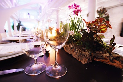 Floral designer Ines Naftali from Goldflower Corp. Flower and Plant Design displayed the centerpieces in carved out logs instead of traditional vases.