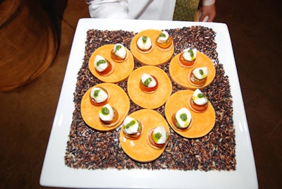 Waiters also served mini caprese bites of tomatoes on crostini topped with mozzarella and pesto.