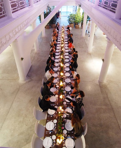All 50 guests sat at one long dinner table in the building's first-floor atrium.