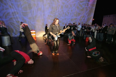 Prior to dropping the kabuki screen, performers from Street Beats break danced while the guests crowded around to watch.