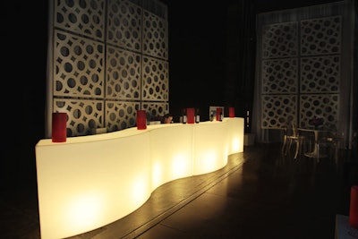 Several glowing, undulating bars dotted the stage lounge area.