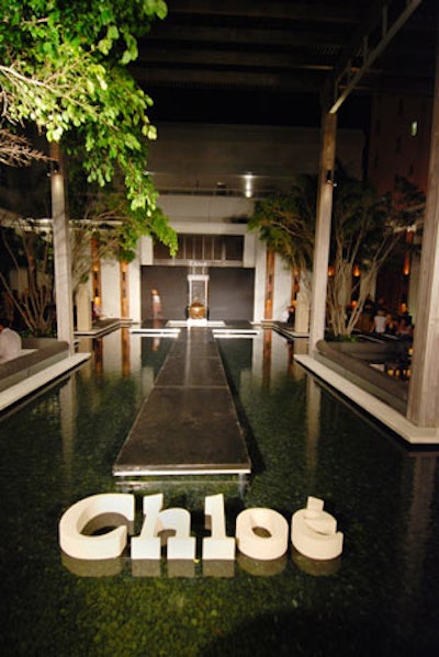 3B Productions put a Chloé logo in the pond at the end of the runway.