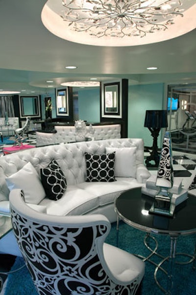 Black and white lounge seating evokes a vintage feel.