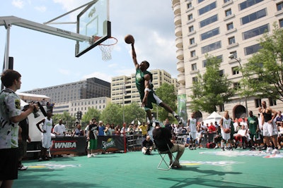 The N.B.A. provided two exhibition courts and interactive games for guests to practice dunk shots.