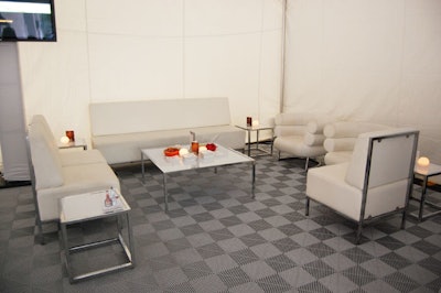 White lounge furniture from Furnishings by Corey filled a corner of the tent.