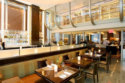 The 82-seat bar room in the front serves more casual fare, while the glass-enclosed dining room is for prix-fixe and tasting menus.