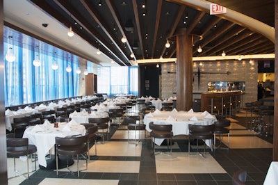 The 5,000-square-foot penthouse-style restaurant offers views of Rush Street and Lake Michigan.