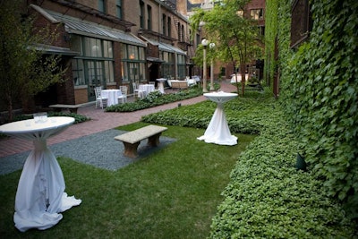 After the fashion show, guests mingled in the Ivy Room's courtyard.