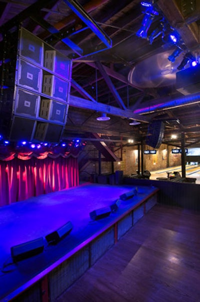 The stage, which sits adjacent to the bowling lanes, is fully equipped for live performances and offers direct access to a private green room.