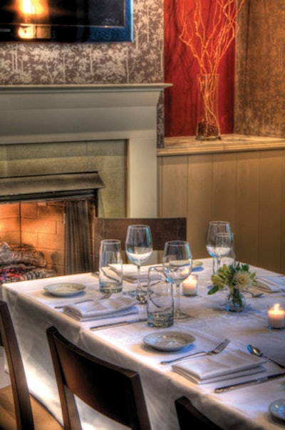 The private dining room seats up to 14 guests and has a gas fireplace, a 52-inch flat-screen HD TV, and audiovisual connections.