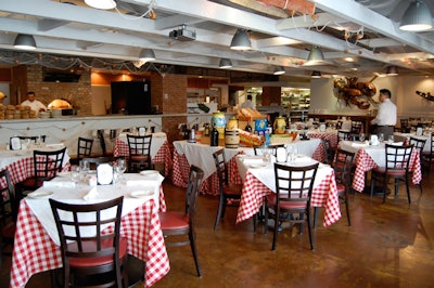 Calamari's decor includes fishnets filled with shells hanging from the ceiling and a large brass lobster on the wall.