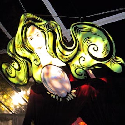 The event's sorceress logo was suspended above the passageway leading into the dining tent.