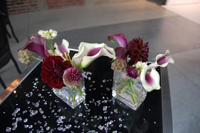 Purple and white flowers topped cocktail tables throughout the space.