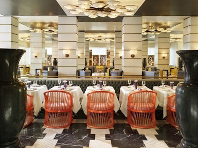 A long gray banquette along the perimeter of the dining room seats 20.