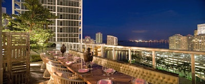 The terrace overlooks Biscayne Bay and downtown Miami.