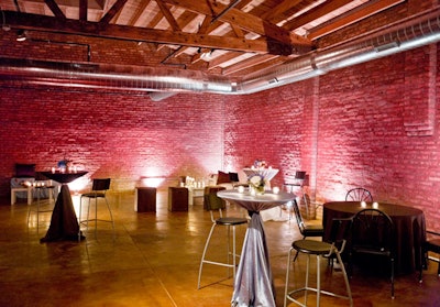 The venue's exposed brick walls can be illuminated in corporate colors.
