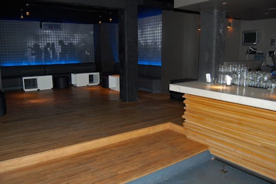 There is a raised area for dancing and a DJ booth in the rear of the lounge.