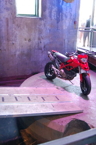 A Ducati motorbike sat on display near the entrance to the venue.