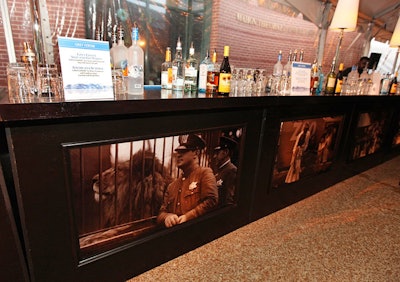 Old photos of the zoo adorned the base of the cocktail tent's 40-foot bar.