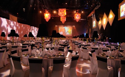 Event coordinator Martha Velasquez draped the inside of the arena and used soft amber uplights to illuminate the space.