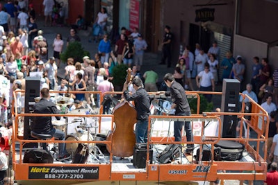 Some performers used electric scissor lifts as their stage.