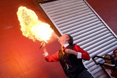 Fire-breathers and stilt-walkers performed along Washington Street.