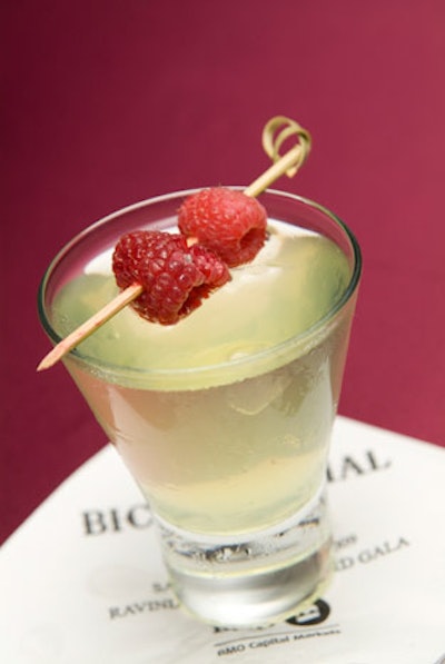 The cocktail reception offered specialty melon-flavored drinks garnished with raspberries.
