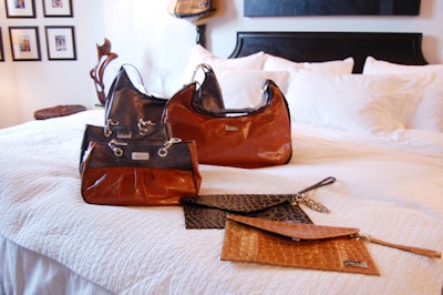 Handbags from the Carina Black line topped the bed in the master suite.