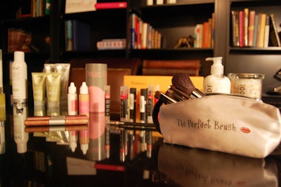 A selection of products from Green Beauty, an online beauty boutique, topped a desk in the home office space.