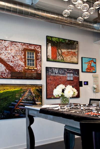 Artwork selected by Alison Goodwin, the homeowner and curator of the Village Gallery and Art Beyond Walls, hung in the hallway.