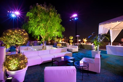 White lounge clusters provided seating amid the crowded party space.