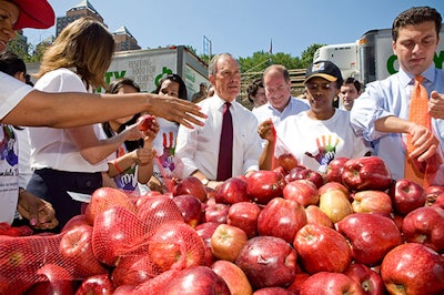 On Tuesday, Mayor Michael Bloomberg stopped by the City Harvest volunteer drive in Union Square and helped pack apples that were delivered to needy families.