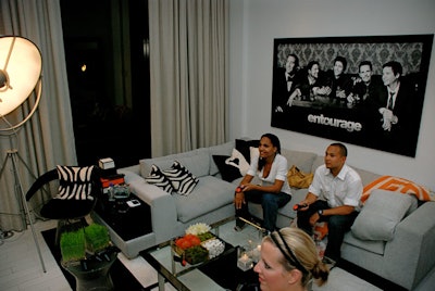 Partygoers played PlayStation3 in the living room of the bungalow.