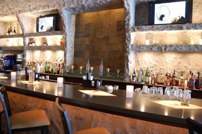 A water feature provides a focal point in the middle of the main bar.