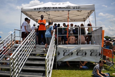 Concertgoers who stopped by the Kia promotion were then permitted to watch the show from a shaded V.I.P. area.