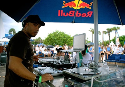 Red Bull's umbrellas kept DJ Dysquo and his turntables safe from the rain.