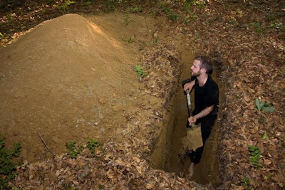 The gravedigger vignette was somber and oddly affecting. The digger himself seemed hot and unhappy and kept checking his blisters, which were visible.